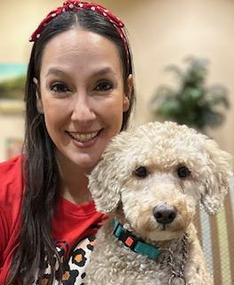 Nelda with therapy dog Juan Pablo