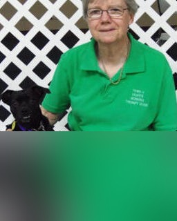 Rose with therapy dog Maddie