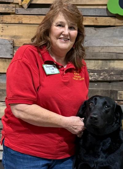 Donna with therapy dog Duke