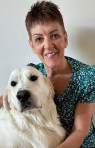 Colleen with therapy dog Walker