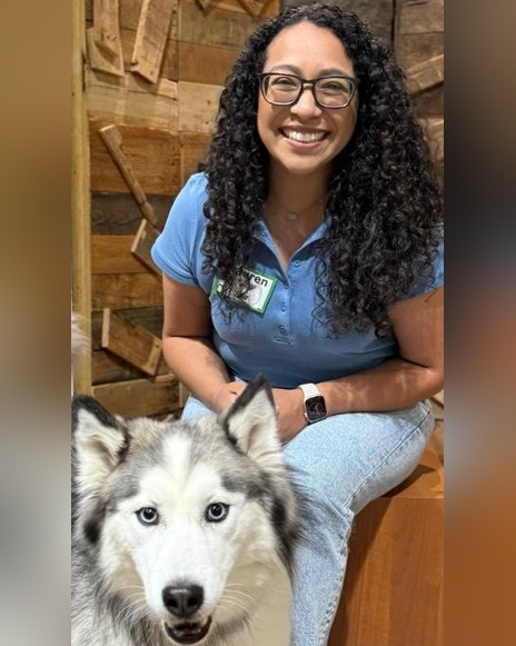 Lauren with therapy dog Lina