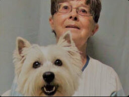 Sandy with therapy dog Molly