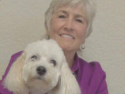 Mary Jo with therapy dog Buddy